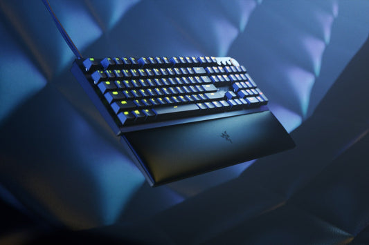 Gaming keyboard with Razer logo on a dark background