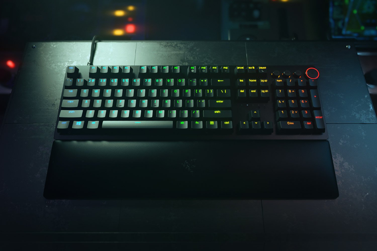 Gaming keyboard with RGB lighting on a dark surface